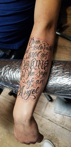 Explore tattoo ideas for book lovers, creative tattoo ideas in Edinboro, available at No Regrets Tattoo (Appointment Only)