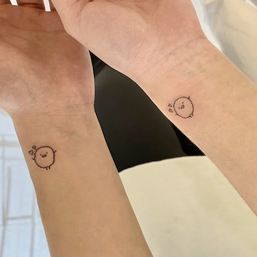 Explore big tattoo ideas female, creative tattoo ideas in Orange, available at Baron Art Tattoo