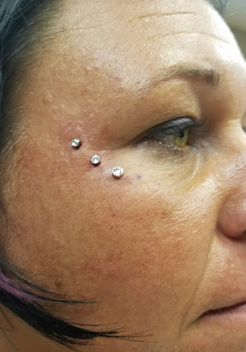 Find under boob tattoo ideas for your next unique tattoo in Valparaiso at Elysium Studios