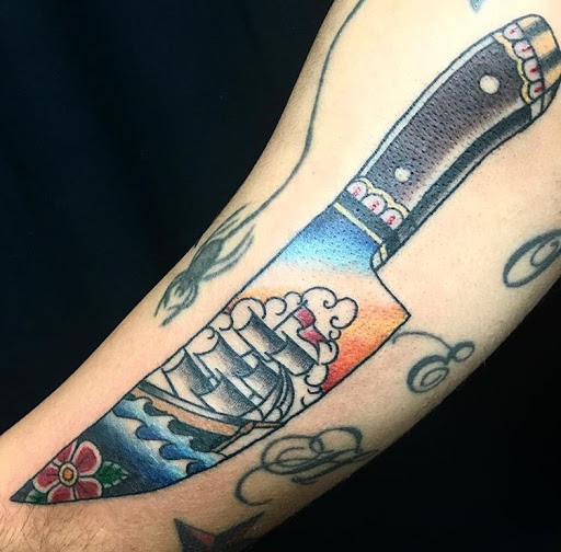 Explore throat tattoo ideas for males, creative tattoo ideas in San Diego, available at Sideshow Tattoo and Piercing