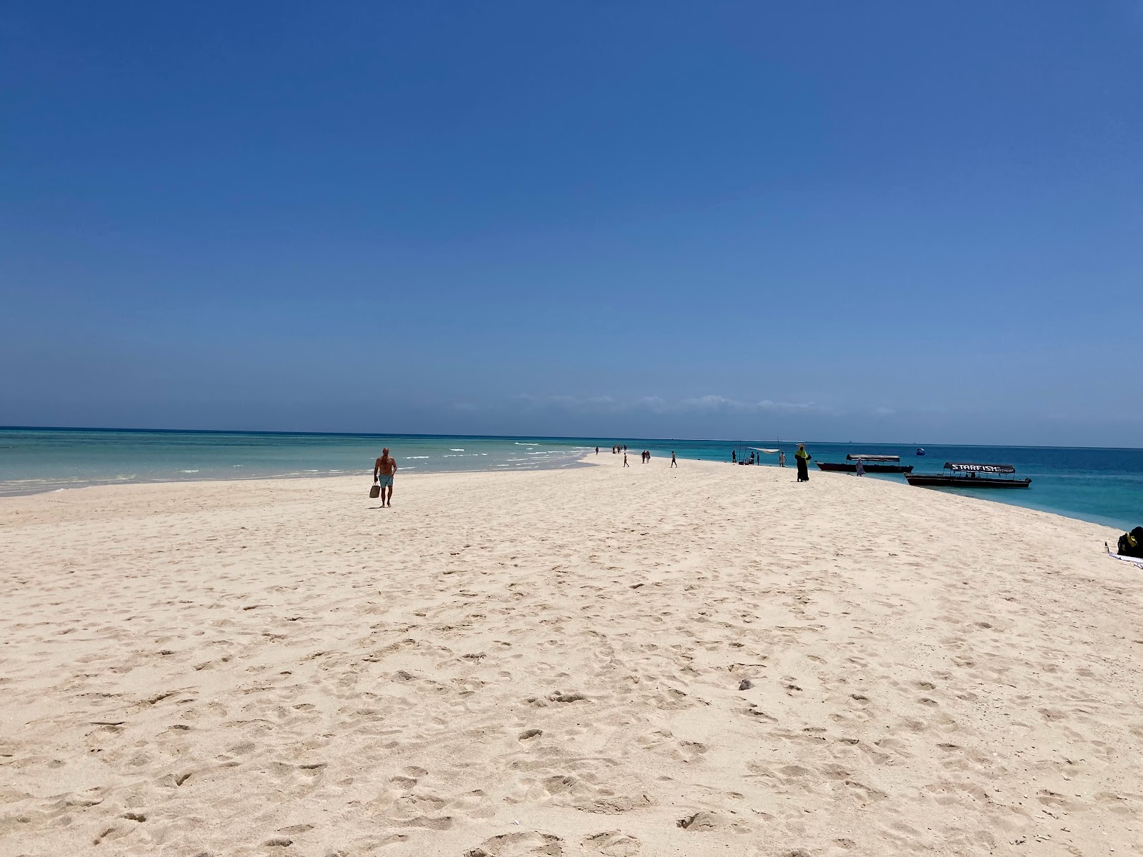 Foto van Nakupenda Beach met helder fijn zand oppervlakte