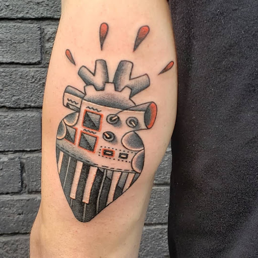 Find feminine skull tattoo ideas for your next unique tattoo in Cincinnati at White Whale