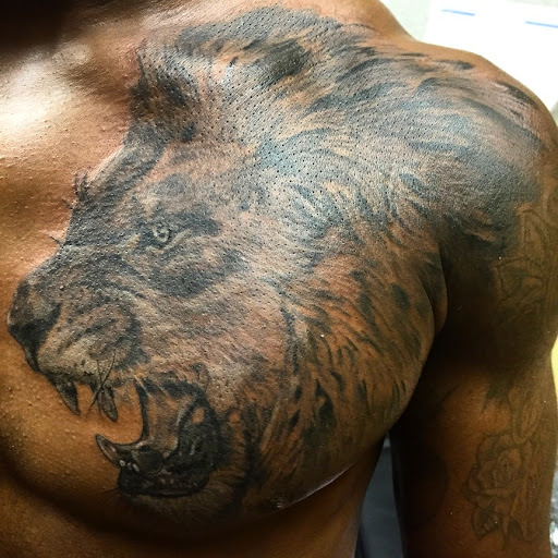 Find owl tattoo ideas for guys for your next unique tattoo in Charlotte at Black Cloud Tattoo & Piercing