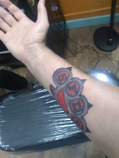 Explore leg tattoo ideas for females, creative tattoo ideas in Duluth, available at Anchors End Tattoo