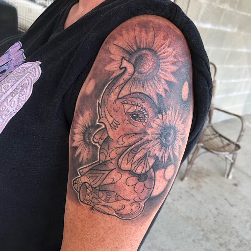 Explore crown tattoo ideas for guys, creative tattoo ideas in Middletown, available at Traditionally Twisted Tattoo