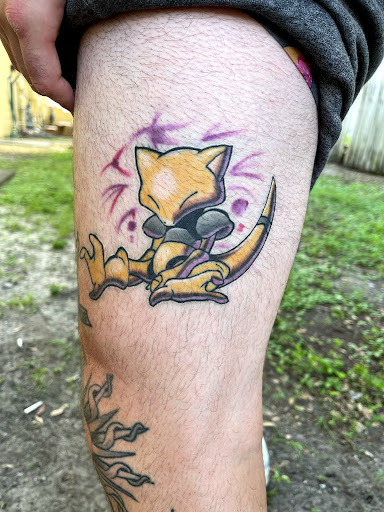 Explore upper arm tattoo ideas for women, creative tattoo ideas in Palm Harbor, available at Angry Owl Tattoo and Piercing