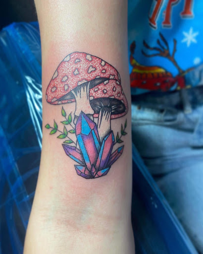 Explore kiss band tattoo ideas, creative tattoo ideas in Kokomo, available at Happys Tattoo Studio