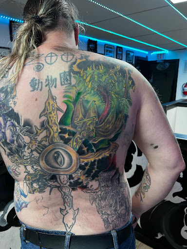 Explore neck tattoo ideas small, creative tattoo ideas in Jefferson, available at Slammin Ink Tattoo