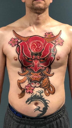 Explore egyptian chest tattoo ideas, creative tattoo ideas in Kingsford, available at Deft Tattoo Studio