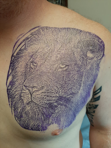 Explore gears of war tattoo ideas, creative tattoo ideas in Lakeview, available at Backwoods Tattoo Studio