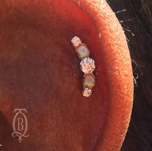 Explore two daughters tattoo ideas, creative tattoo ideas in Marietta, available at The Queen Bee Tattoo and Piercing Parlour