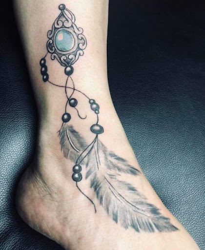 Explore tattoo ideas female thigh, creative tattoo ideas in Kingsland, available at These Colors Dont Run Tattoo & Piercing