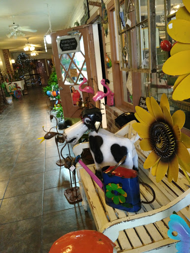 Gift Shop «Whispering Winds - A Happy Little Gift Shop», reviews and photos, 439 N Donnelly St, Mt Dora, FL 32757, USA