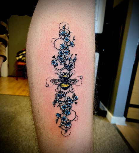 Explore daffodil tattoo ideas, creative tattoo ideas in Mercer, available at Skips Tattoo Shop