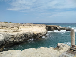 Cala di San Pietro dei Canali'in fotoğrafı küçük koy ile birlikte
