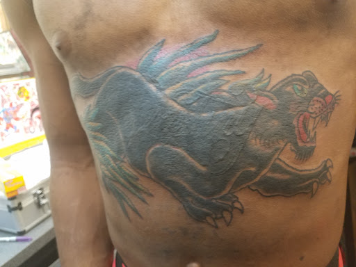 Explore gold tattoo ideas, creative tattoo ideas in Jacksonville, available at Erics Tattoos