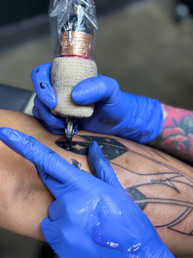 Explore left hand tattoo ideas, creative tattoo ideas in Bloomington, available at Crystal Moon Body Arts