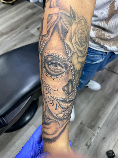 Explore boxing gloves tattoo ideas, creative tattoo ideas in Holland, available at Mi Vida Ink