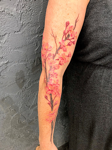 Explore hand tattoo ideas for woman, creative tattoo ideas in Powell, available at Elysium Body Enhancements