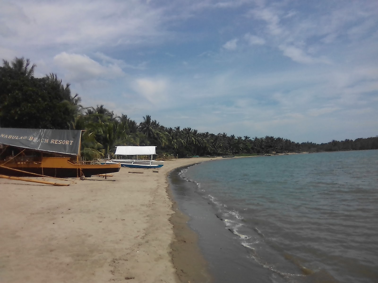 Foto di Nabulao Beach con una superficie del acqua turchese