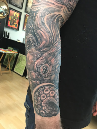 Explore tattoo photography ideas, creative tattoo ideas in Milford, available at Golden Hammer Tattoo Studios