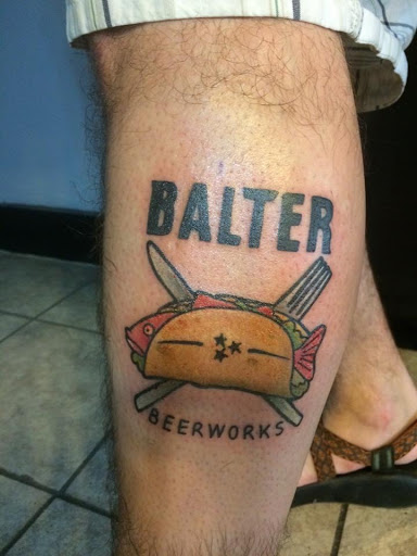 Explore feather tattoo ideas for men, creative tattoo ideas in Knoxville, available at Ambition Tattoo