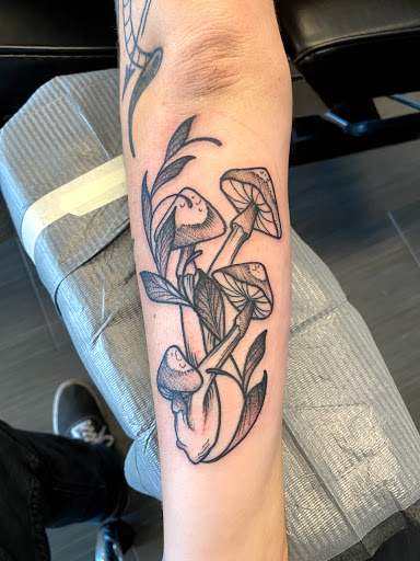 Explore poetic tattoo ideas, creative tattoo ideas in Palm Harbor, available at Angry Owl Tattoo and Piercing