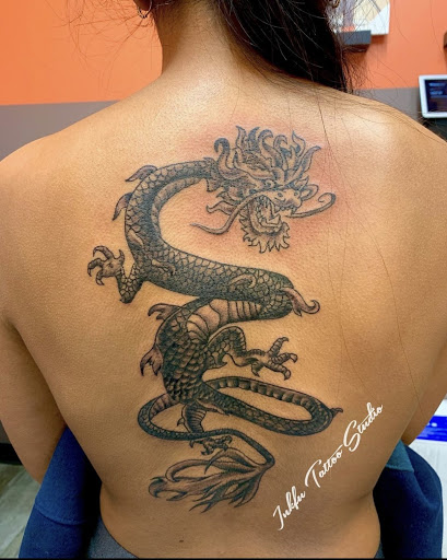 Explore back of head tattoo ideas, creative tattoo ideas in Omaha, available at Inkfu Tattoo Studio