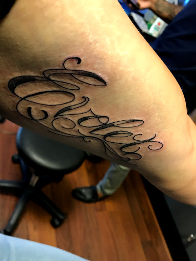 Explore mens behind ear tattoo ideas, creative tattoo ideas in Dallas, available at The Henderson Collective