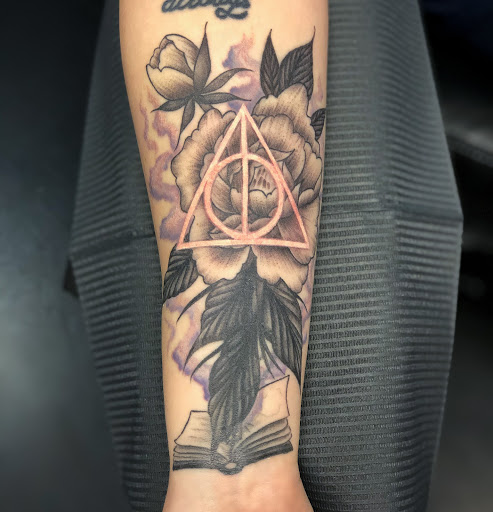 Find friend tattoo ideas for your next unique tattoo in Saint Petersburg at Foolish Pride Tattoo Co.