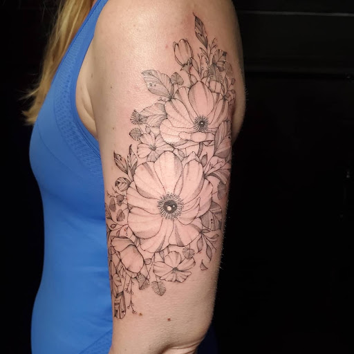 Explore christian cross tattoo ideas, creative tattoo ideas in Stevens Point, available at International Ink Tattoos