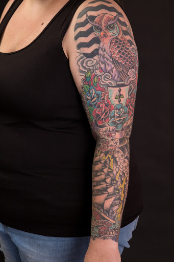 Explore flower half sleeve tattoo ideas, creative tattoo ideas in Conway, available at Hero Tattoo