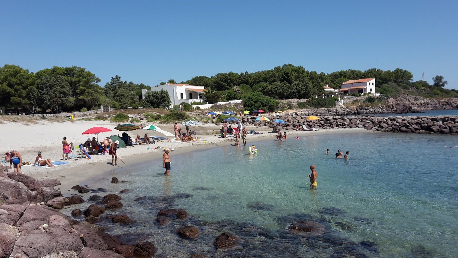 Fotografija Punta Nera beach z svetel fin pesek površino