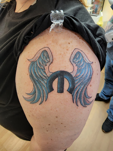Explore equality tattoo ideas, creative tattoo ideas in Anniston, available at Artistic Addictions