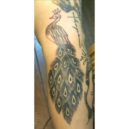 Explore dog tags tattoo ideas, creative tattoo ideas in Hillsboro, available at MOO MANU TATTOO