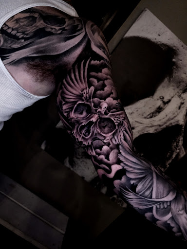 Explore santa tattoo ideas, creative tattoo ideas in College Station, available at Legacy Tattoo Lounge