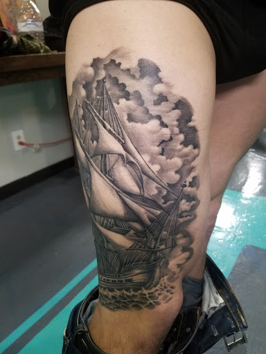 Explore handcuff tattoo ideas, creative tattoo ideas in Houston, available at Los Muertos Tattoo Studio and Art Gallery