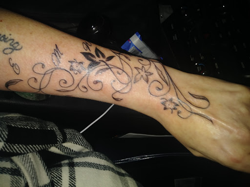 Tattoo Shop «Raining Ink», reviews and photos, 420 W 7th St, Columbia, TN 38401, USA