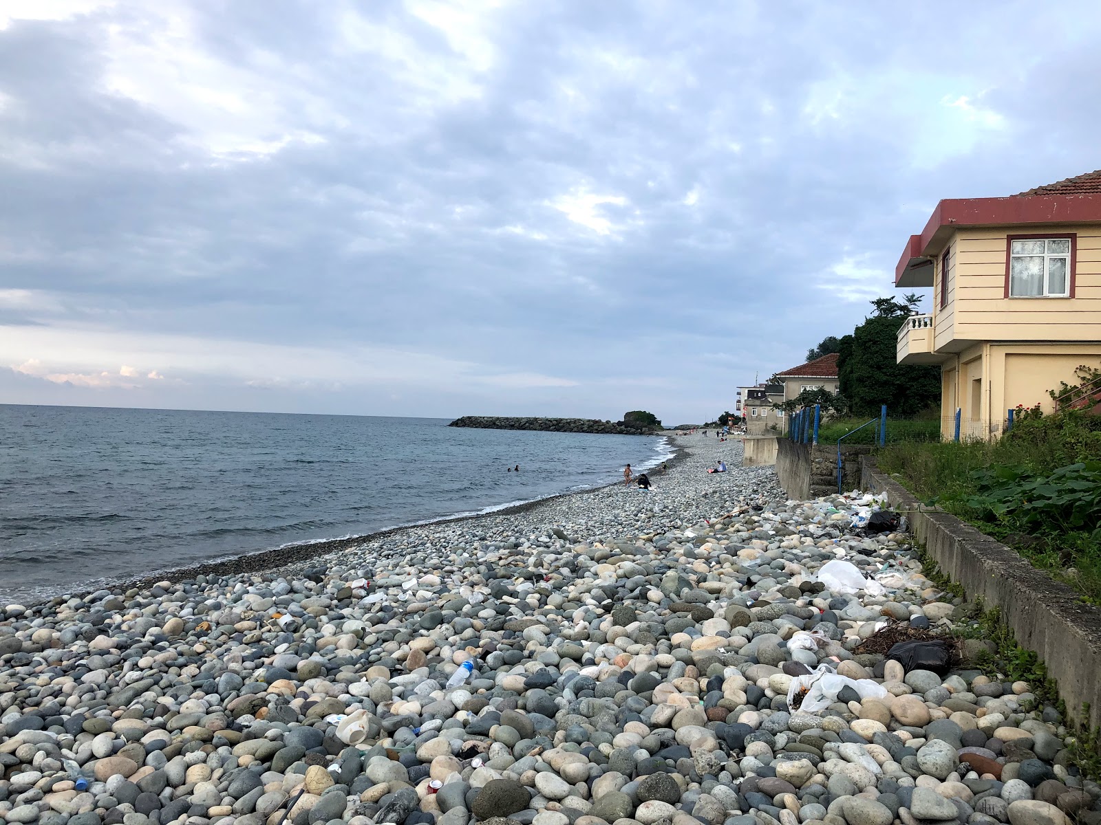 Foto av Saraykoy Family Beach med grå sten yta
