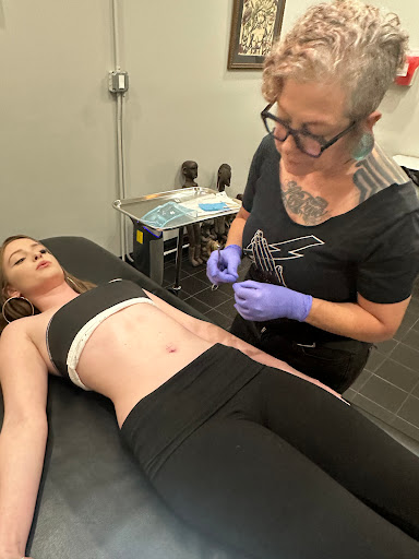 Explore inside ear tattoos ideas, creative tattoo ideas in Atlanta, available at Kolo Piercing and Body Arts