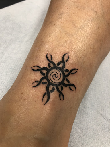 Find tattoo ideas music notes for your next unique tattoo in Crystal Lake at Monster Ink Tattoo & Piercing Studio