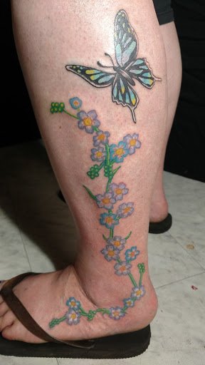 Explore deer hunting tattoo ideas, creative tattoo ideas in Fayetteville, available at Stigma Ink Tattoo & Piercing Studio