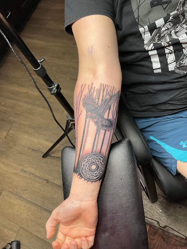 Explore wrestling tattoos ideas, creative tattoo ideas in Orange Park, available at Big City Tattoo and Piercing