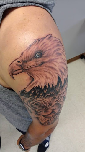 Explore tattoo ideas on the side, creative tattoo ideas in Evans Mills, available at Studio No.8 Body Art Gallery