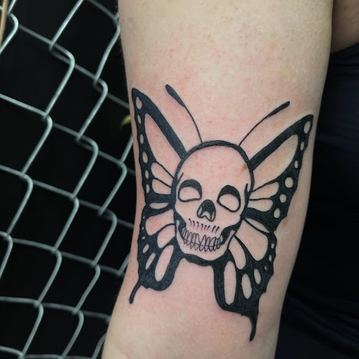 Explore chest tattoo ideas woman, creative tattoo ideas in Buffalo, available at True Gloom Tattoo Studio