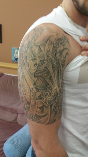 Explore lady and the tramp tattoo ideas, creative tattoo ideas in North Woodstock, available at Kellys Tattoo