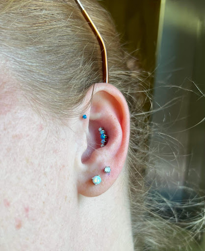 Explore tattoo ideas for lower stomach, creative tattoo ideas in Kirksville, available at Properly Pierced