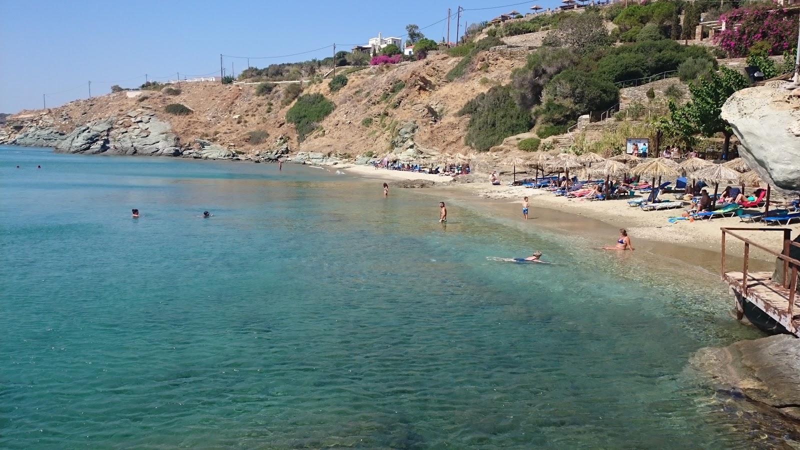 Foto von Delavoyas Beach mit heller sand Oberfläche