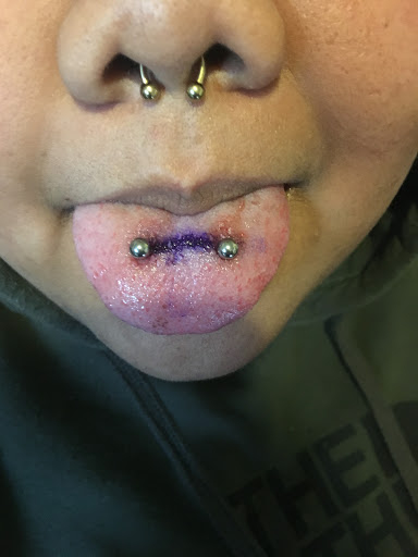 Find in between boob tattoo ideas for your next unique tattoo in Pittsburg at Collective Arts Tattoos & Piercings