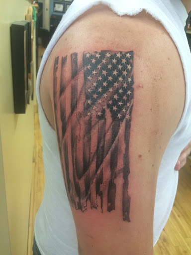 Explore travel adventure tattoo ideas, creative tattoo ideas in Rochester, available at Sacred Heart Studios